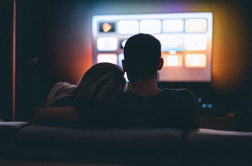 couple, dark room, watching